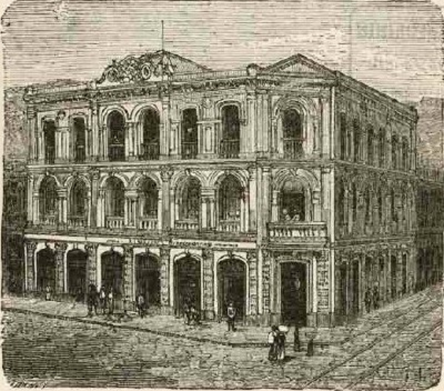 Ein altes Gebäude mit Bogengängen, Säulen und Fenstern, umgeben von einer Gruppe von Menschen, die auf dem Boden stehen, mit dem Text "Victorian Building in London, England" unten.