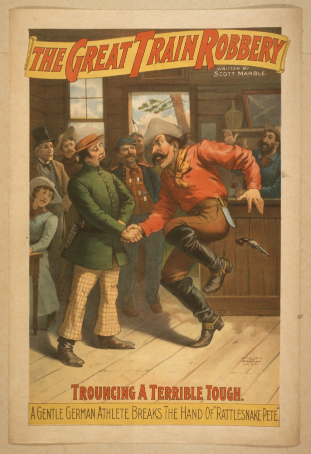 Ein Plakat, das eine Gruppe von Menschen auf einem Boden zeigt, einer hält eine Waffe in der Hand, mit Text oben und unten, der "The Great Train Robbery - Trouching a Terrible Tough" lautet.