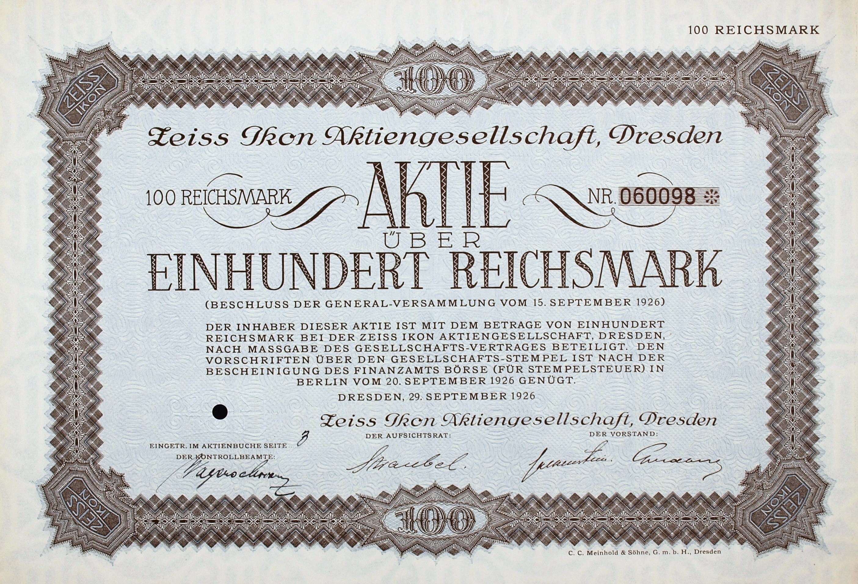 Altes deutsches Aktienzertifikat mit der Aufschrift "Aktie über Einhundert Reichmark" für 100 Reichmarks mit schwarzem Rand und gedrucktem Text.