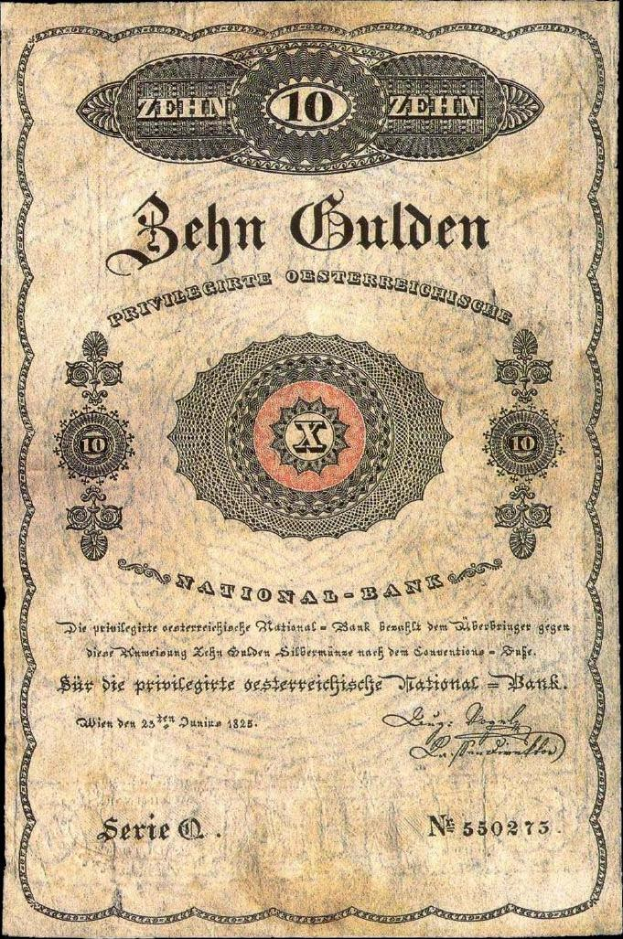 Ein altes deutsches Banknote mit einem schwarzen Hintergrund, das das Gesicht eines Mannes, den Text "Nationalbank von Deutschland" und ein Logo unten zeigt.